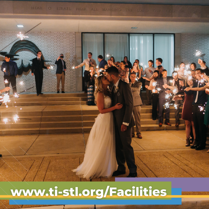 TEXT: www.ti-stl.org/Facilities IMAGE: Wedding couple on TI front steps surrounded by guests with sparklers