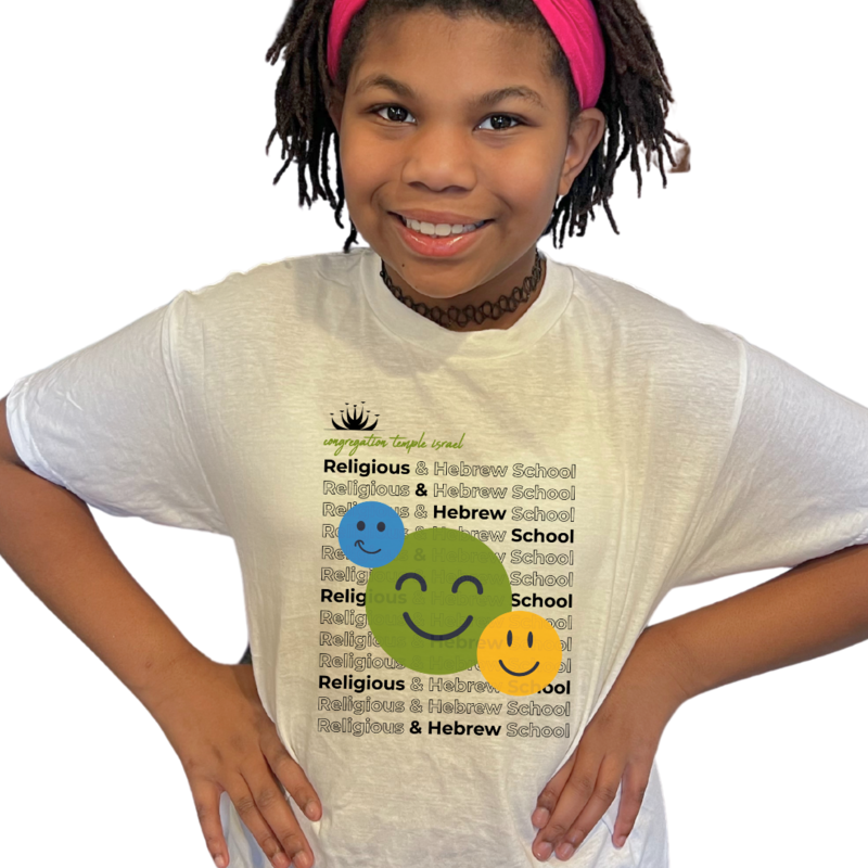 TIRS student wearing TIRS smiley face t-shirt